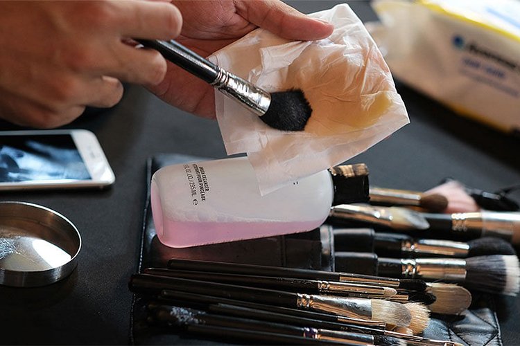 How do you clean your brushes and sponges?